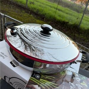 Shiny Steel Casserole with Red Accent